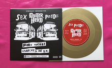 Load image into Gallery viewer, Sex Pistols - Pretty Vacant / Anarchy 7&quot; Gold Vinyl Guitar Hero Single 2007