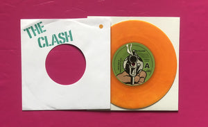 Clash - White Man In Hammersmith Palais 7" Alt Lyrics Orange Vinyl